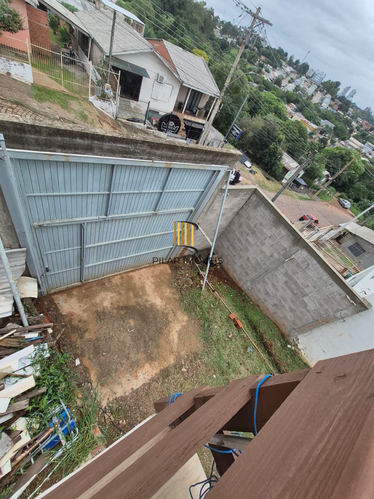 Belíssima casa de 2 dormitórios com um amplo pátio na cidade de Passo Fundo