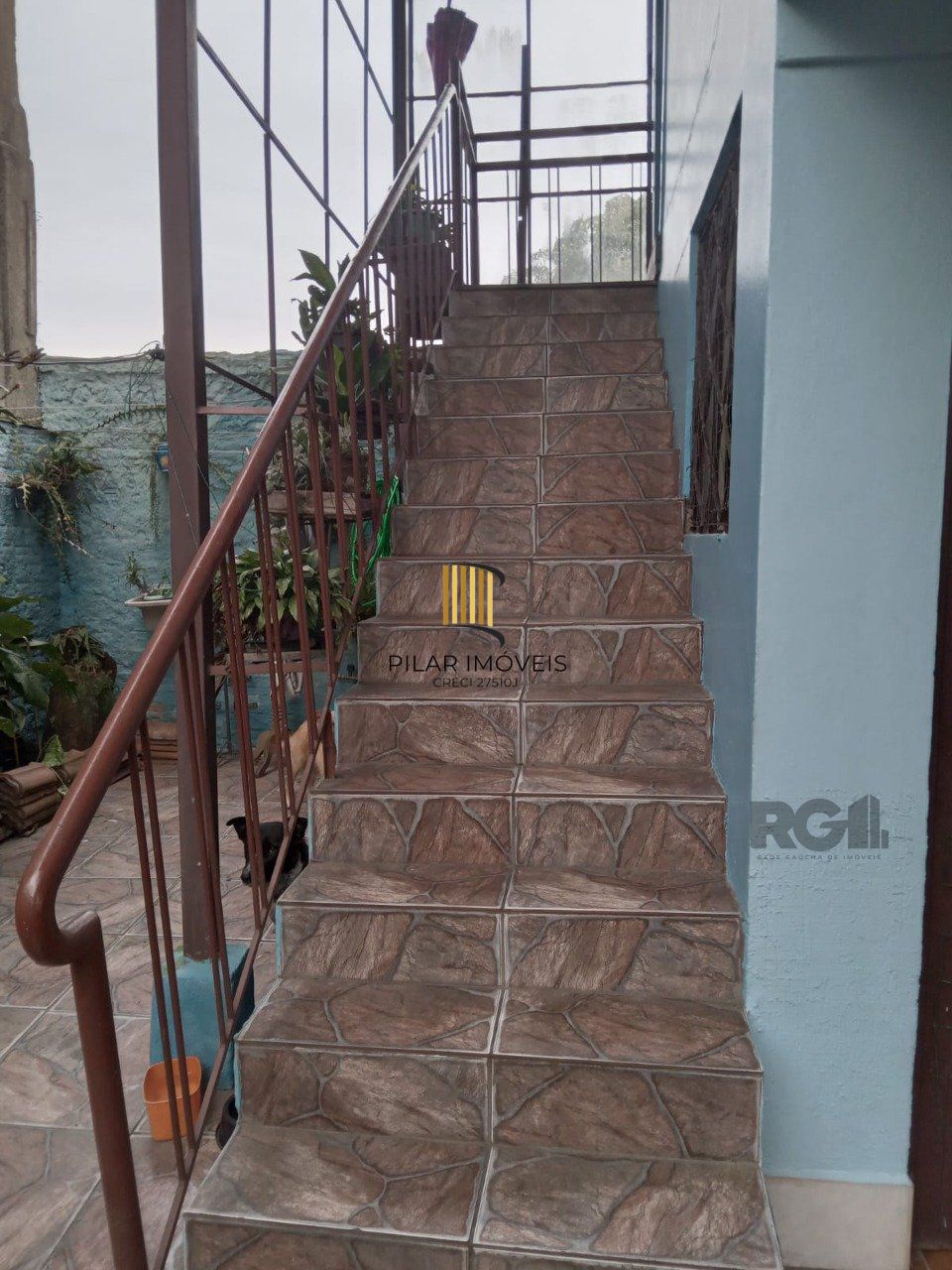 Casa com 3 quartos, vaga de garagem, churrasqueira, no bairro Partenon, Porto Alegre/RS