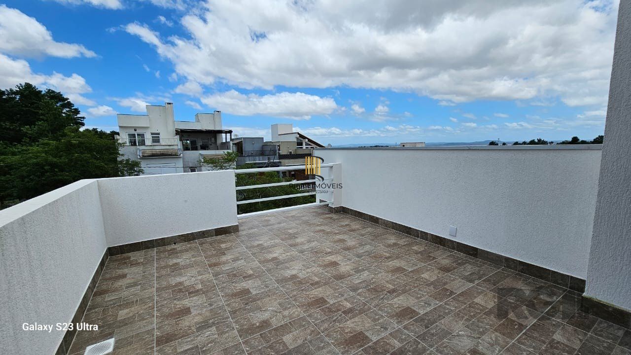 Casa 3 dormitórios no bairro Guarujá