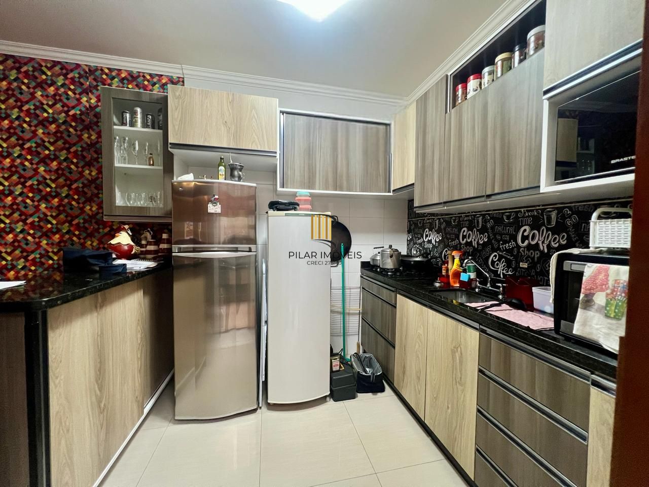 Casa em condomínio 2 dormitórios sem um com closet, vaga coberta, no bairro Cel. Aparicio Borges.