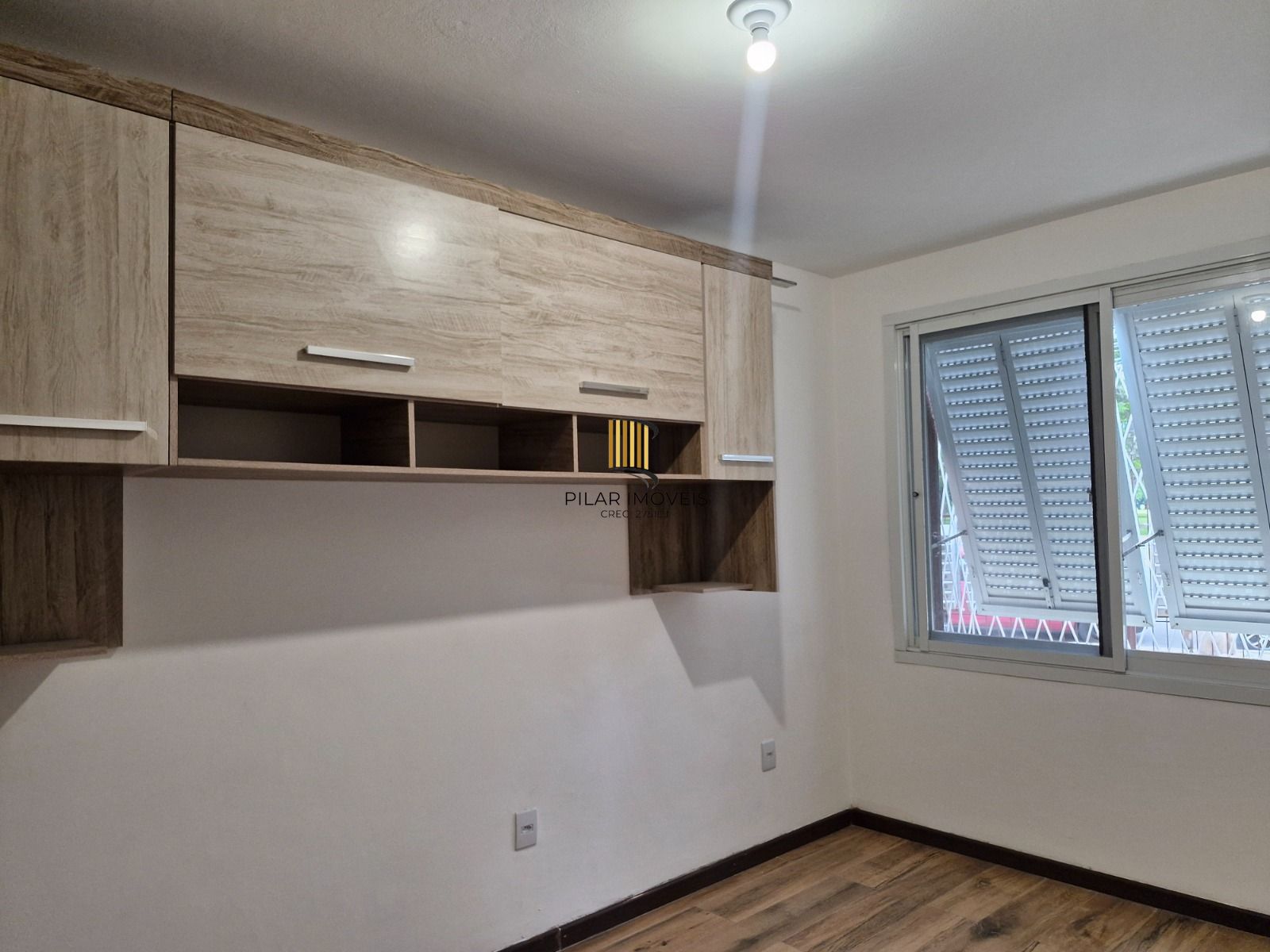 Apartamento de 2 dormitórios com vista para o Marinha no bairro Menino Deus em Porto Alegre/RS