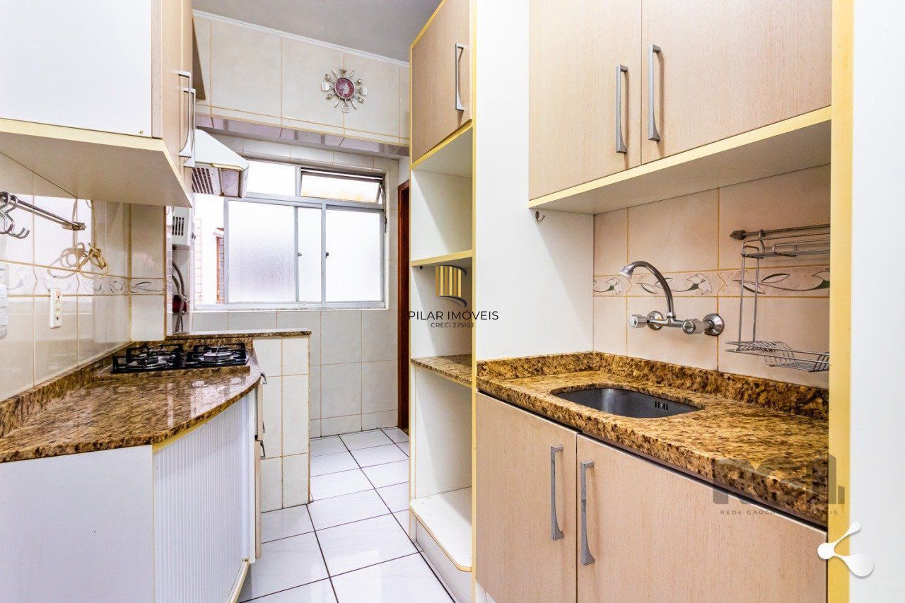 Apartamento com 2 dormitórios e 1 vaga de garagem escriturada  no bairro Rio Branco