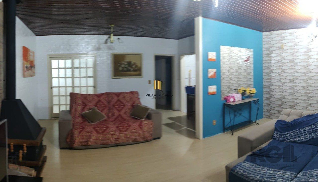 casa com 4 dormitórios, sendo 1 suíte, garagem para dois carros fechada, no bairro Santa Isabel em Viamão