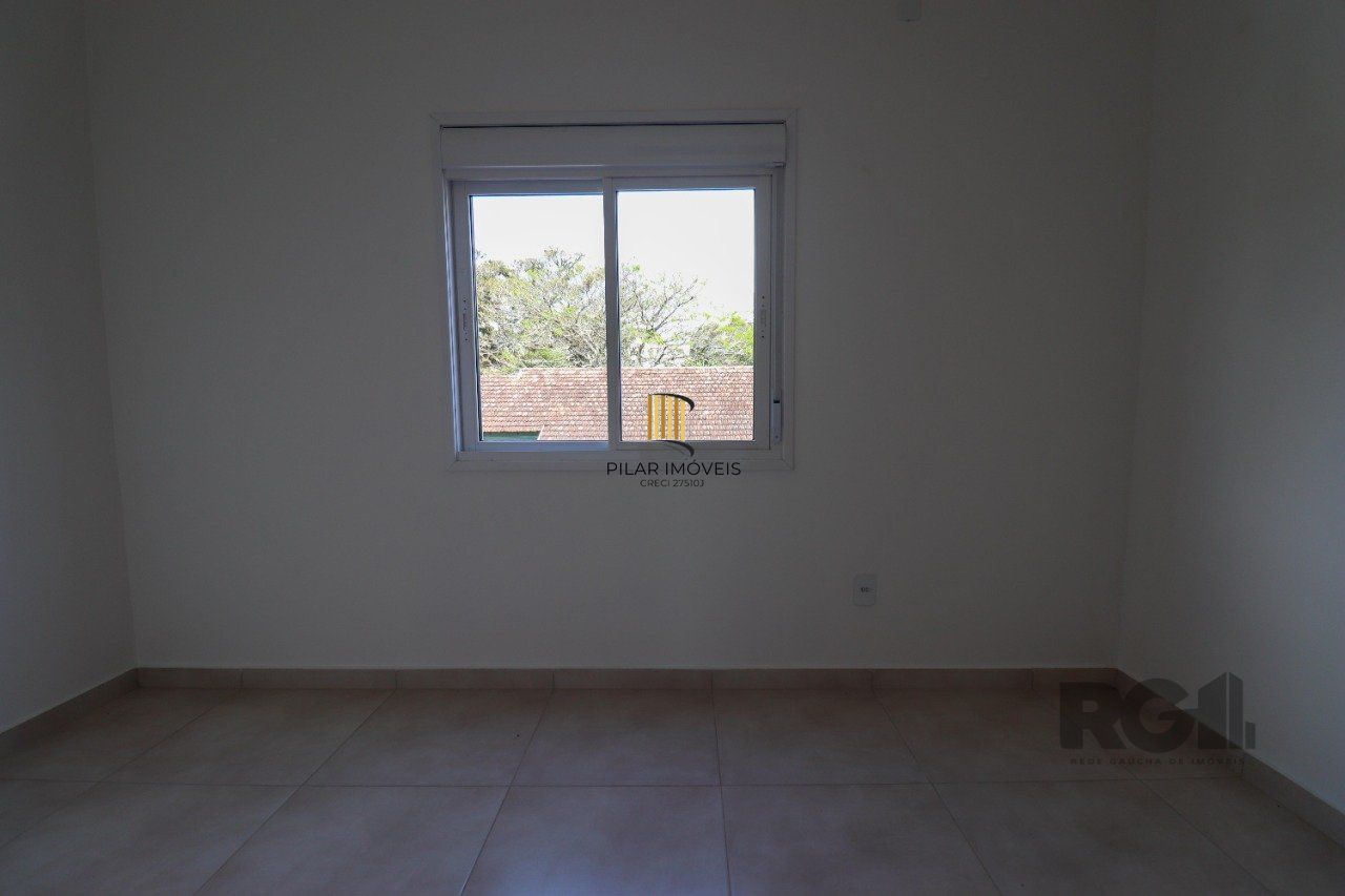 CASA ESTILO SOBRADO COM 2 QUARTOS E PÁTIO, À VENDA NO BAIRRO VILA NOVA, EM PORTO ALEGRE/RS