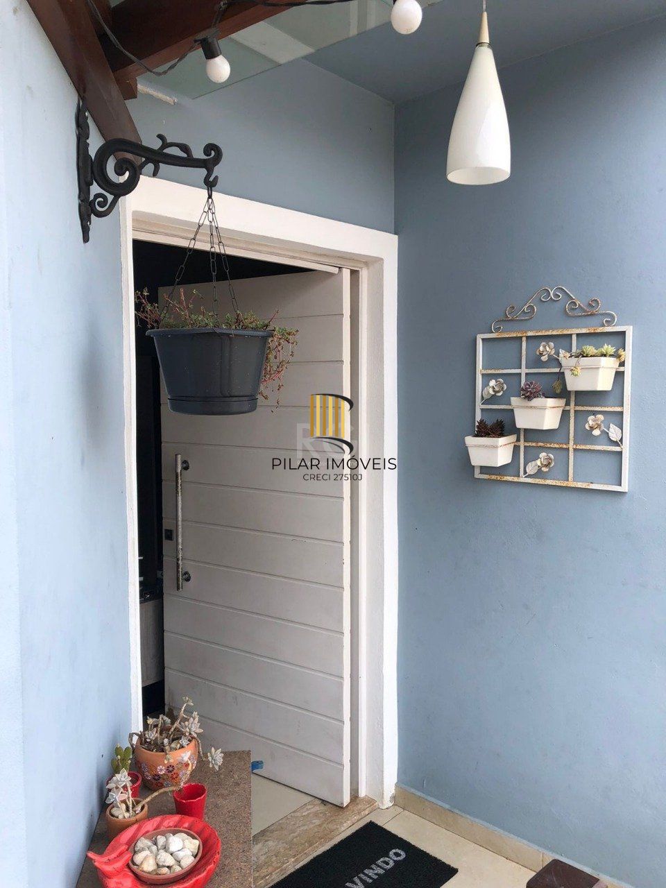 Casa com 3 dormitórios 2 suítes, área gourmet, vaga de estacionamento,  Guarujá,  Porto Alegre RS 