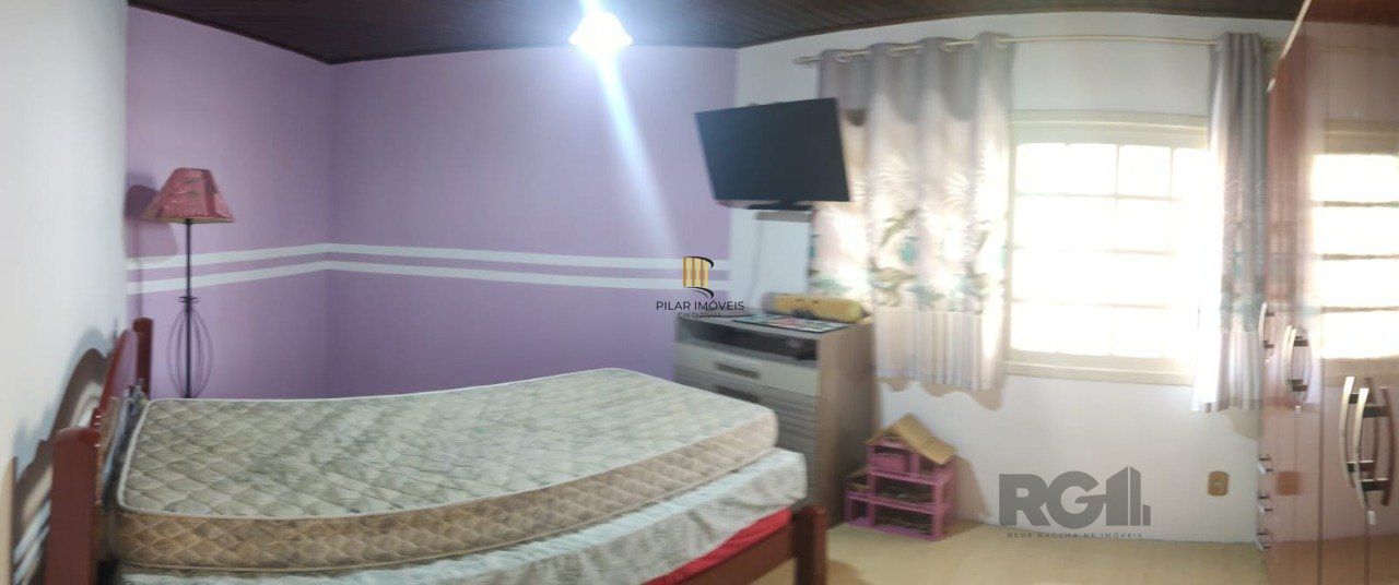 casa com 4 dormitórios, sendo 1 suíte, garagem para dois carros fechada, no bairro Santa Isabel em Viamão