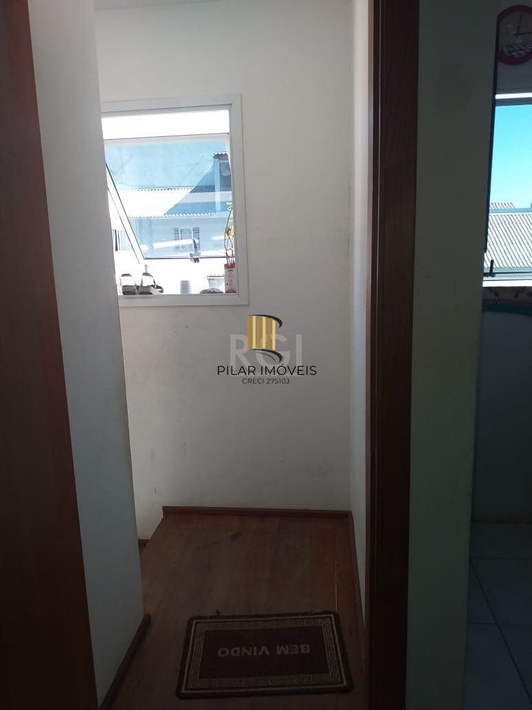 Casa com 2 quartos, banheiro, área de serviço, cozinha, vaga de garagem, no bairro Aberta dos Morros/RS