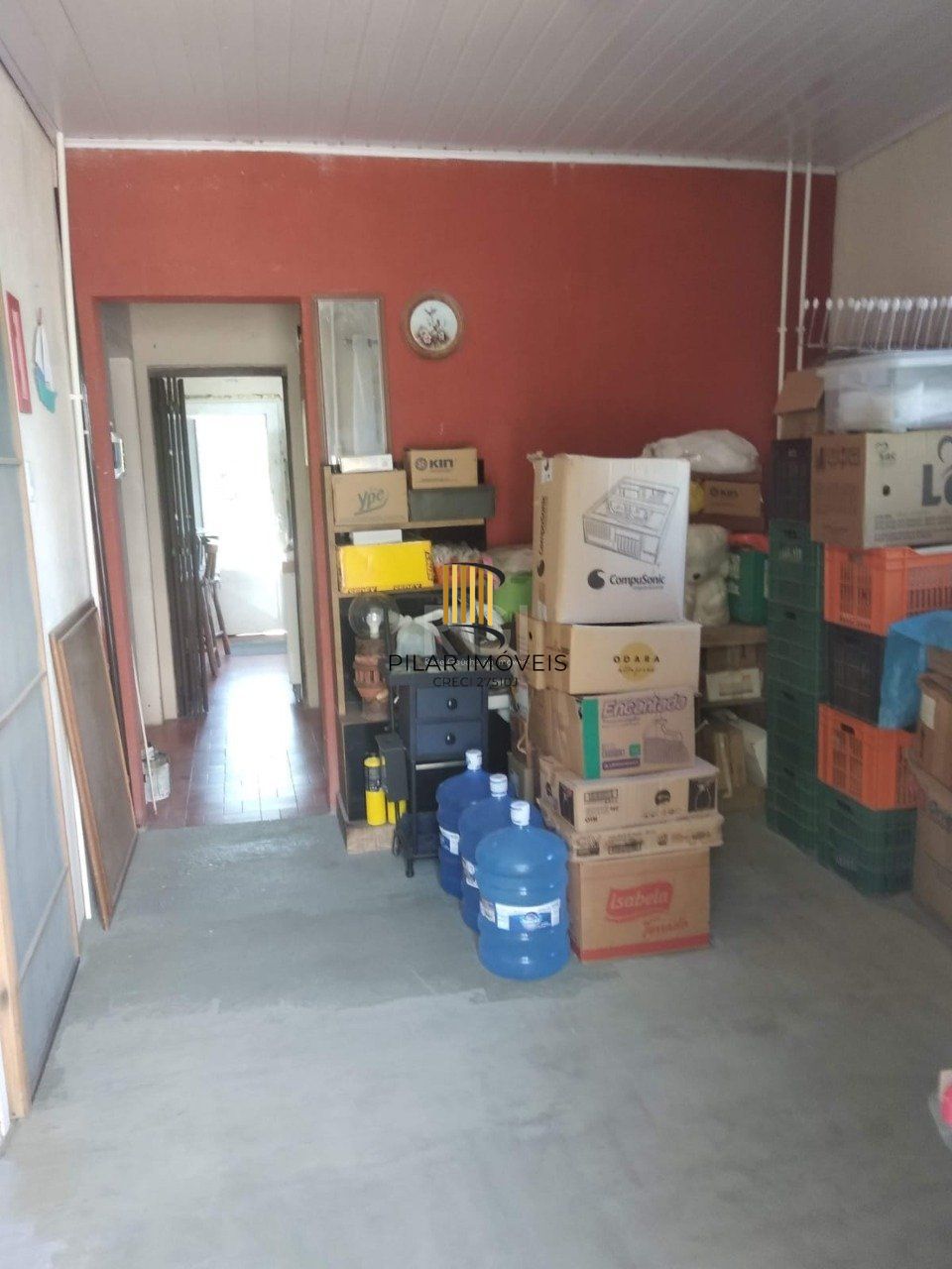 Casa 2 dormitórios, sala, banheiro garagem coberta, terreno 694m² bairro Camaquã, Porto Alegre/RS