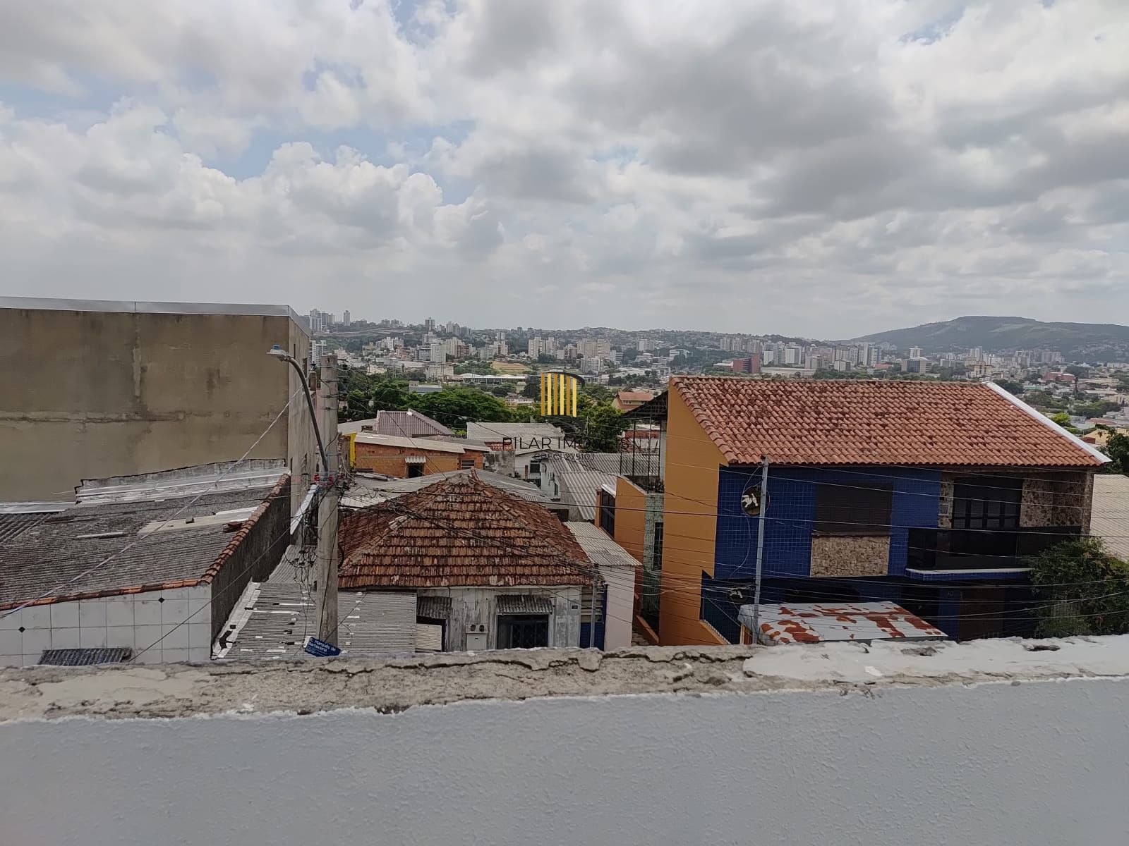 Casa 3 dormitórios no bairro Partenon