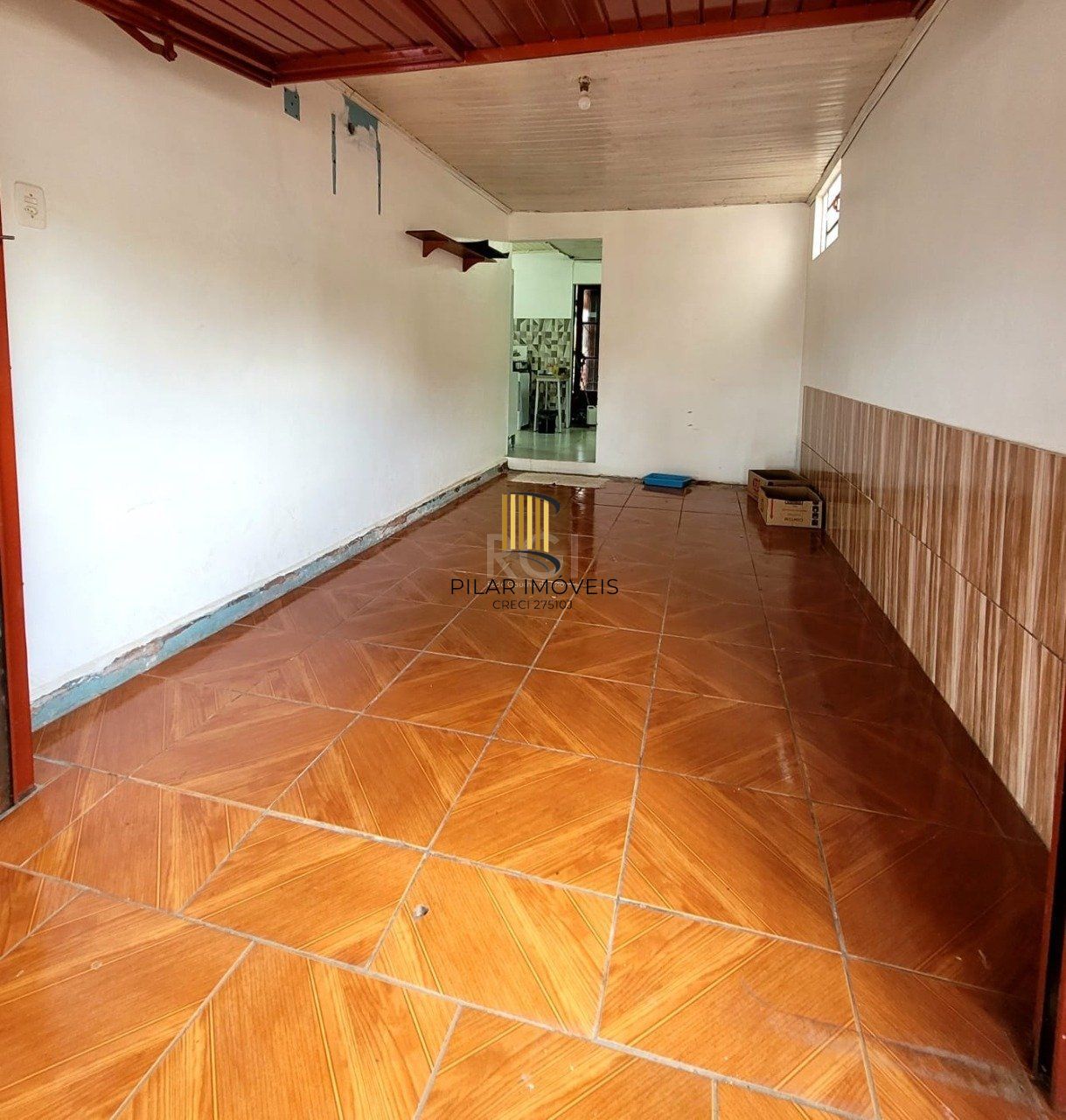 Casa com 3 quartos, 1 suíte, vaga de garagem, varanda, no bairro Hilda, Cruz Alta/RS