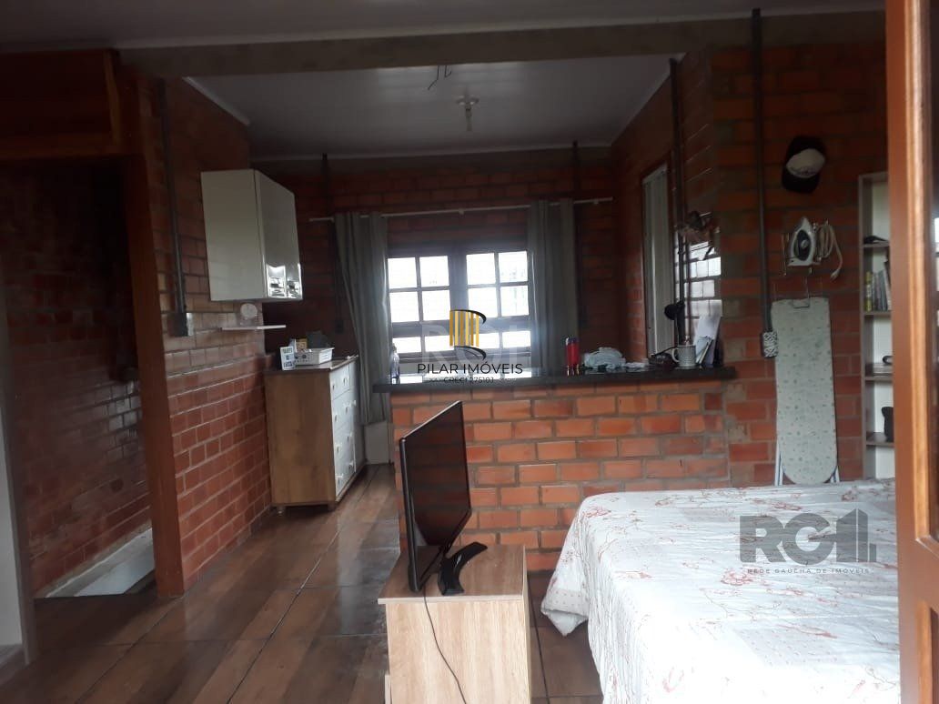 Casa com 3 dormitórios, sendo 1 suíte no bairro Hípica