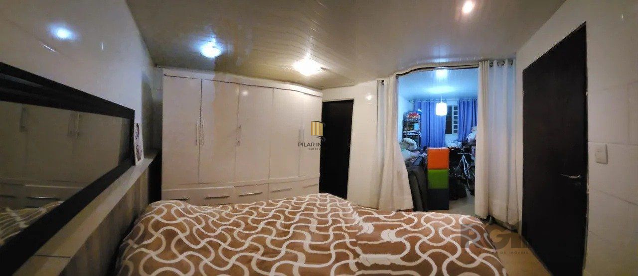  Casa com 4 quartos, 1 suíte, 7 vagas de garagem, churrasqueira -  97,32m² no bairro Jardim Carvalho, Porto Alegre/RS