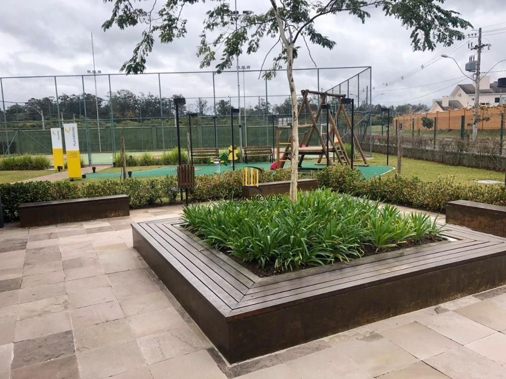 CASA EM CONDOMINIO TÉRREA,  3 SUÍTES 4 VAGAS DE GARAGEM, EM GRAVATAI RS