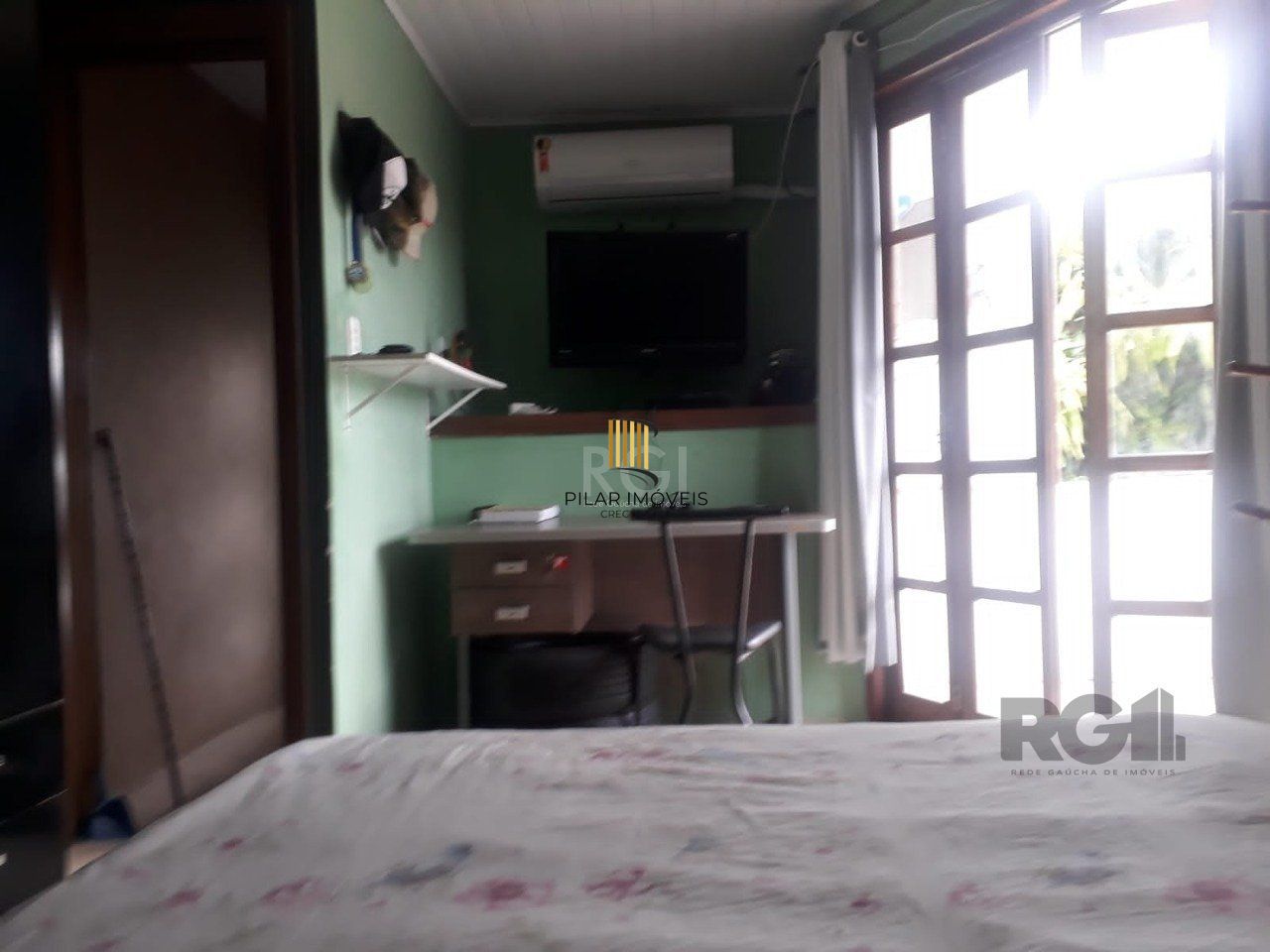 Casa com 3 dormitórios, sendo 1 suíte no bairro Hípica