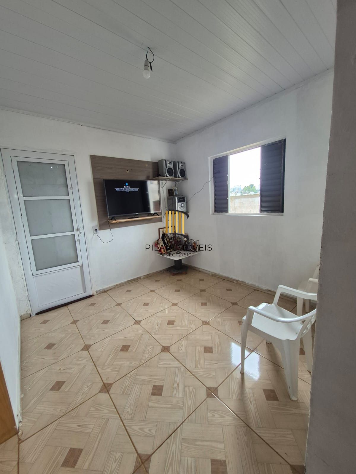 Belíssima casa de 2 dormitórios com um amplo pátio na cidade de Passo Fundo