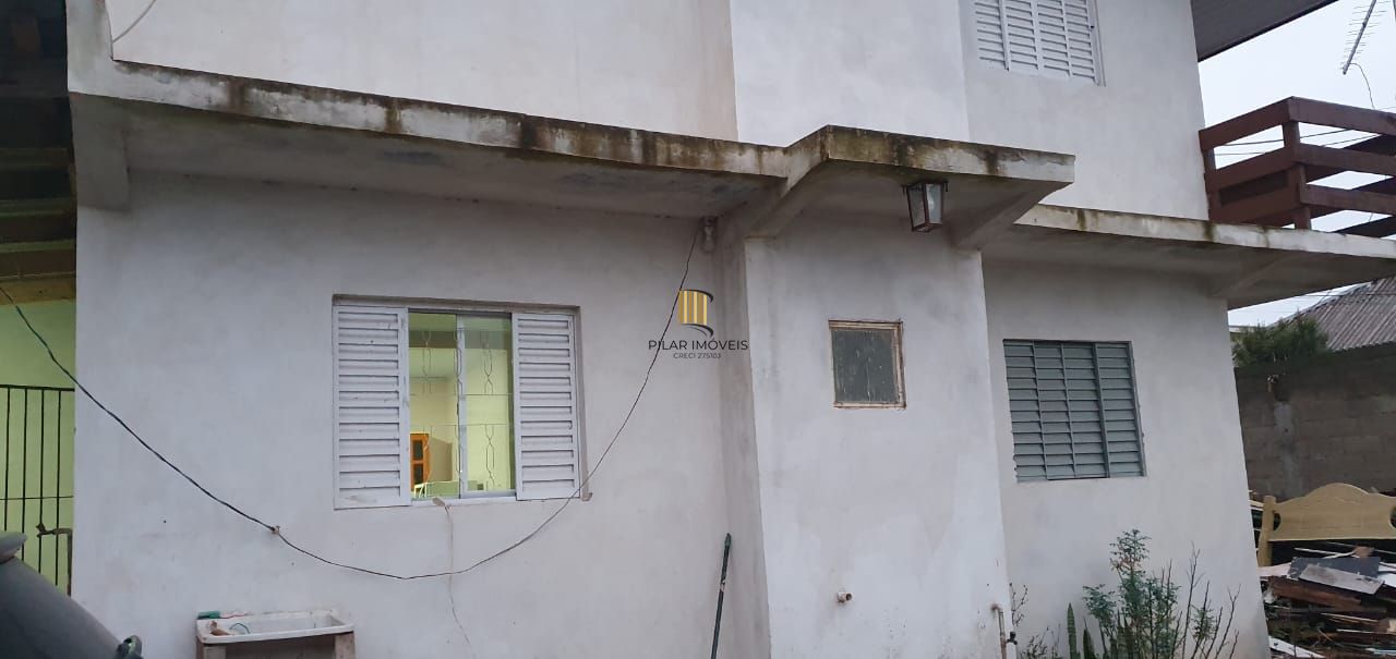 Belíssima casa de 2 dormitórios com um amplo pátio na cidade de Passo Fundo
