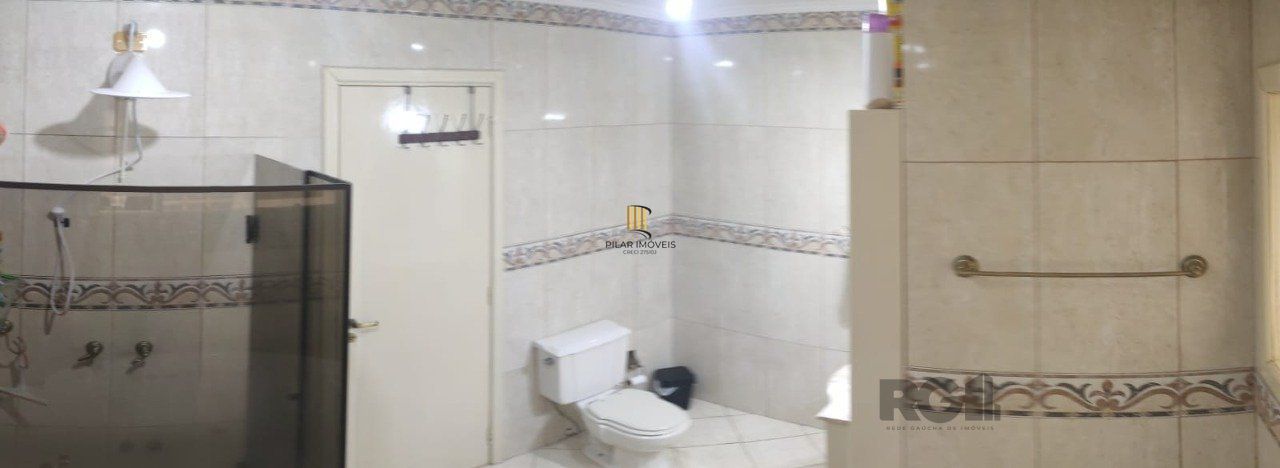 casa com 4 dormitórios, sendo 1 suíte, garagem para dois carros fechada, no bairro Santa Isabel em Viamão