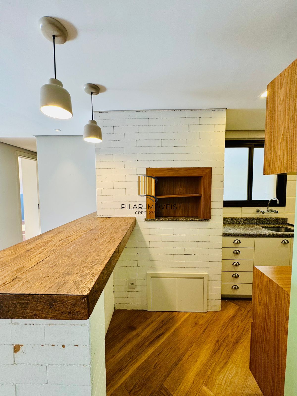 Apartamento Garden à Venda no Petrópolis – 2 Dormitórios, Suíte e 2 Vagas | Porto Alegre