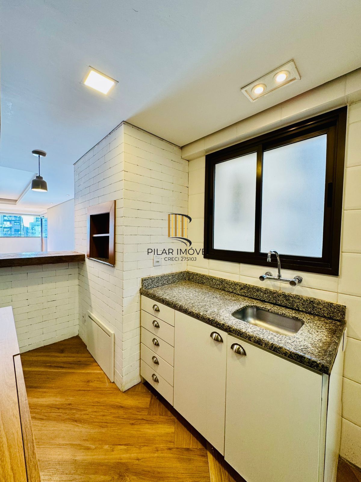 Apartamento Garden à Venda no Petrópolis – 2 Dormitórios, Suíte e 2 Vagas | Porto Alegre