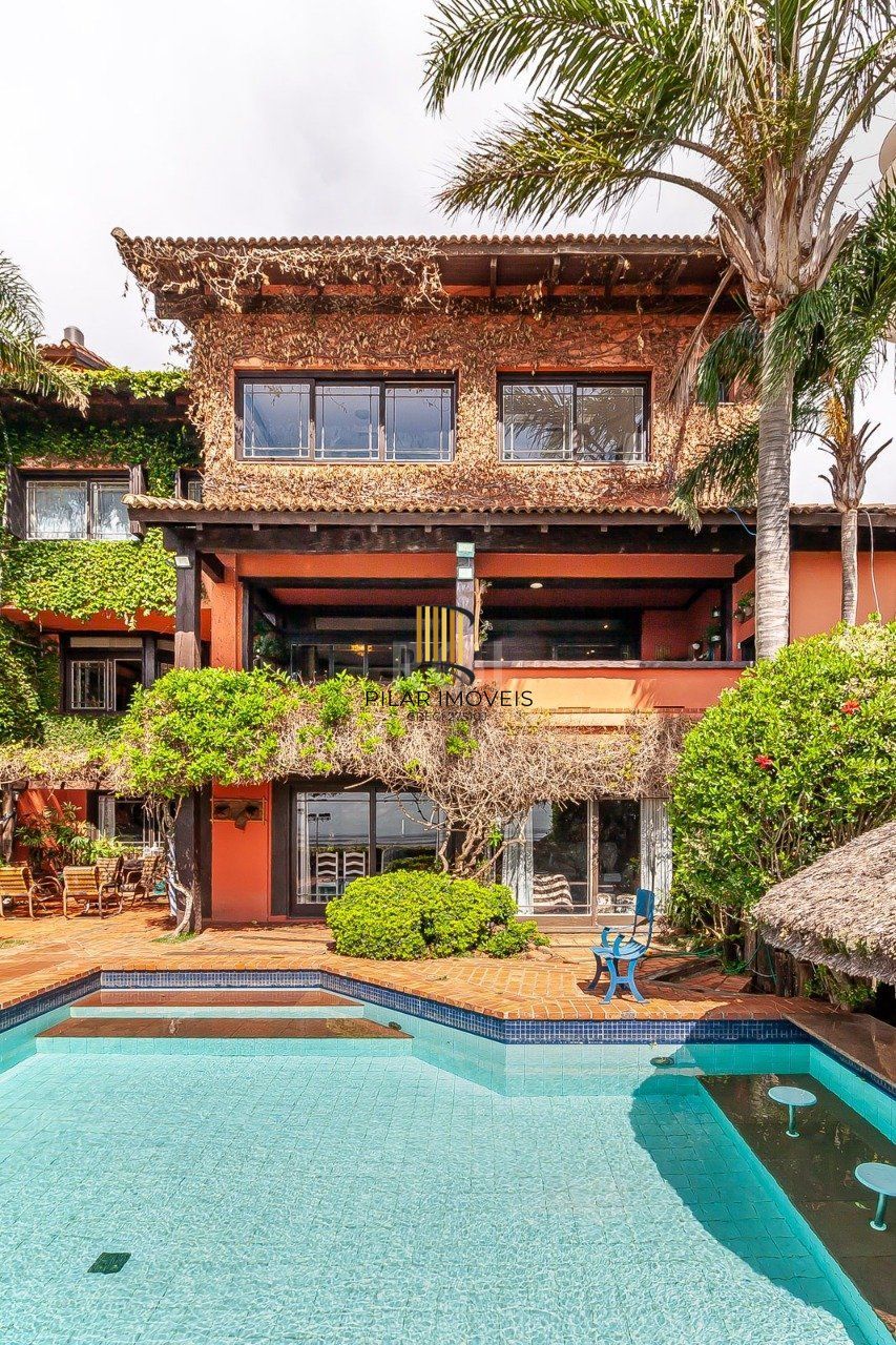 Casa de Condomínio 5 dormitórios no bairro Santa Tereza