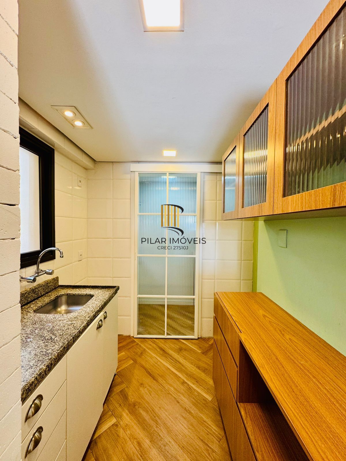 Apartamento Garden à Venda no Petrópolis – 2 Dormitórios, Suíte e 2 Vagas | Porto Alegre