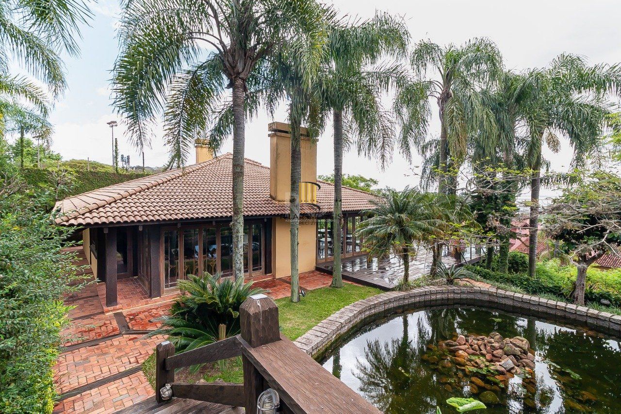 Casa de Condomínio 5 dormitórios no bairro Santa Tereza