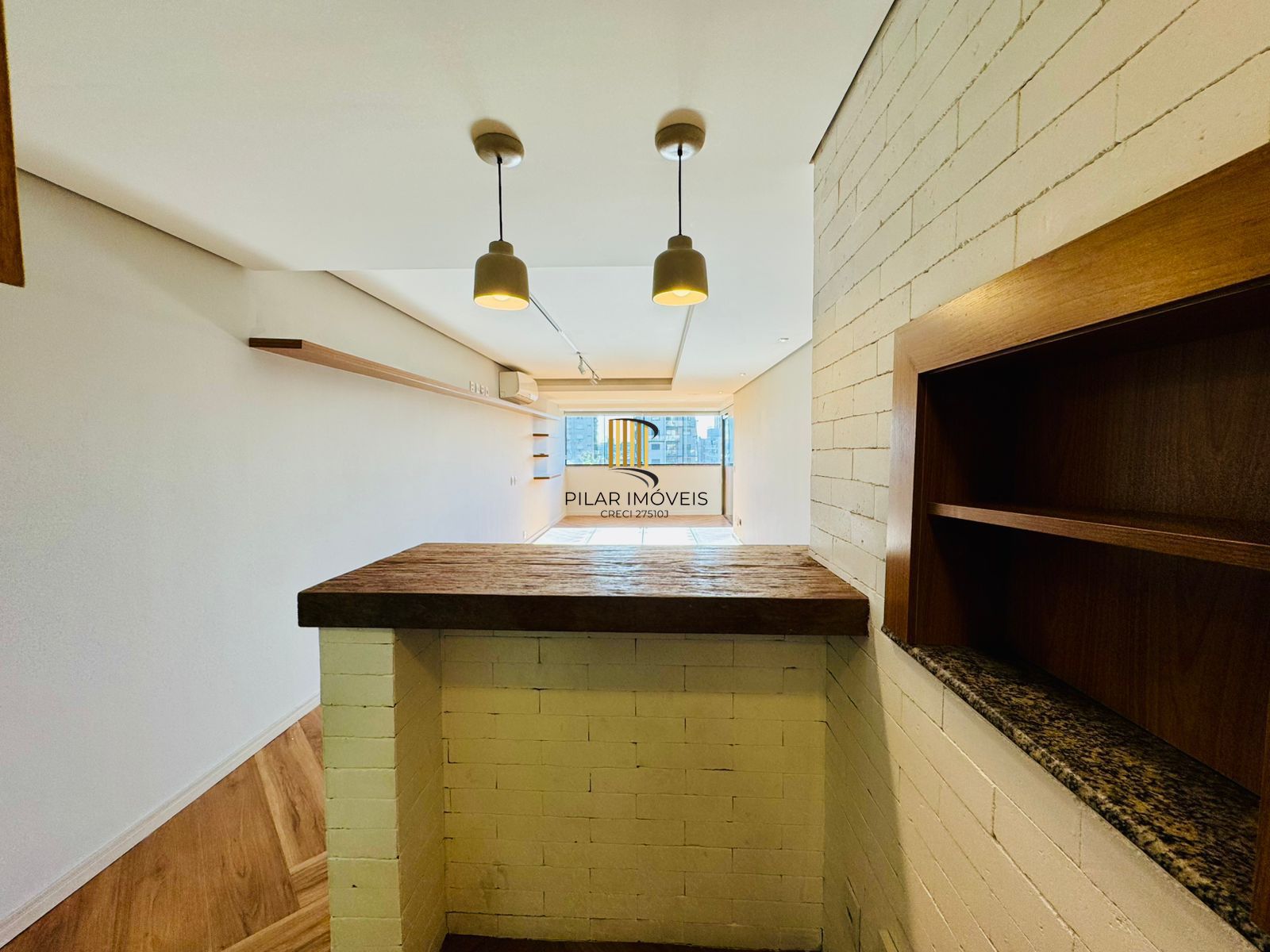 Apartamento Garden à Venda no Petrópolis – 2 Dormitórios, Suíte e 2 Vagas | Porto Alegre