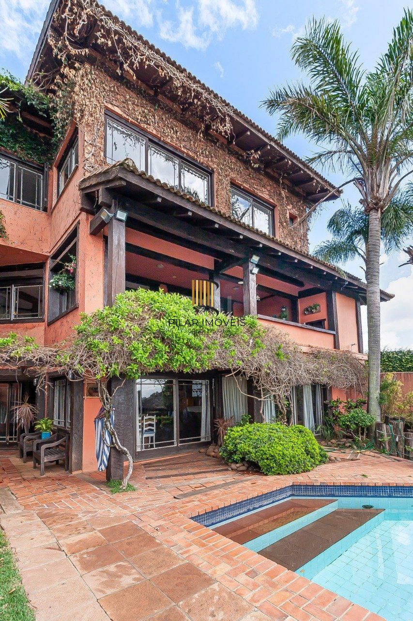 Casa de Condomínio 5 dormitórios no bairro Santa Tereza