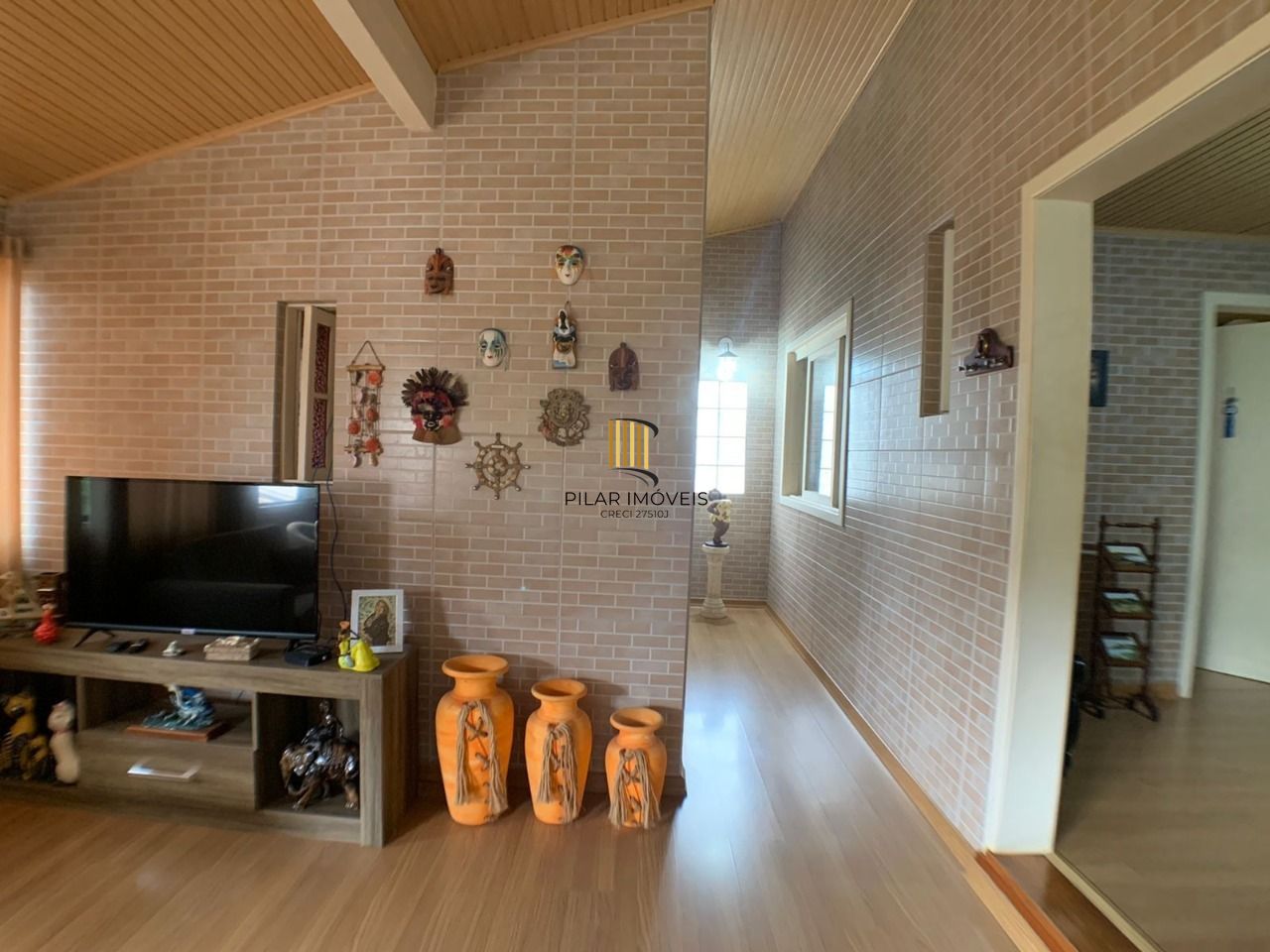 Casa para Venda - 318m², 3 dormitórios, Piscina, Bairro Guarujá