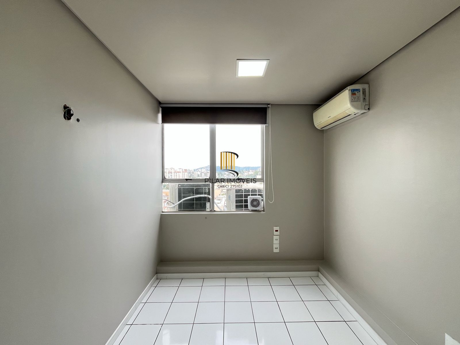 Sala para venda na Tristeza prédio Spazzio