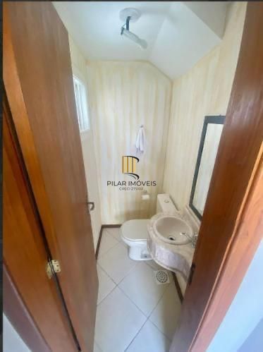 CASA EM CONDOMÍNIO - 3 DORMITÓRIOS - SUITE - 2 VAGAS - VILA CONCEIÇÃO - POA RS
