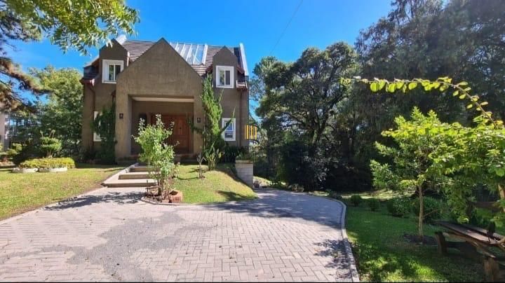 CASA COM PISCINA INDOOR NO CONDOMÍNIO VIVENDAS DA SERRA – CANELA/RS