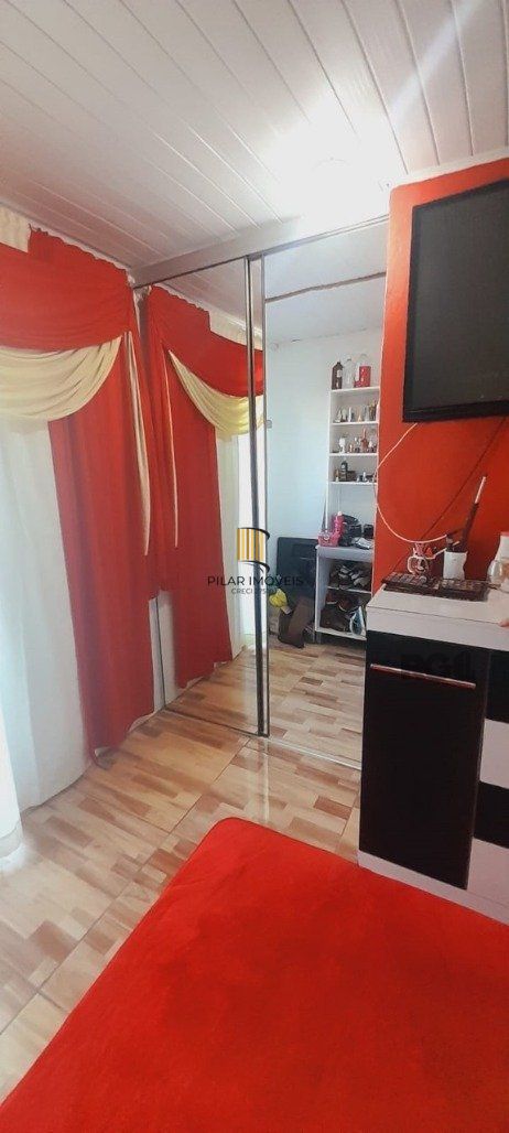 Casa 6 dormitórios no bairro Restinga