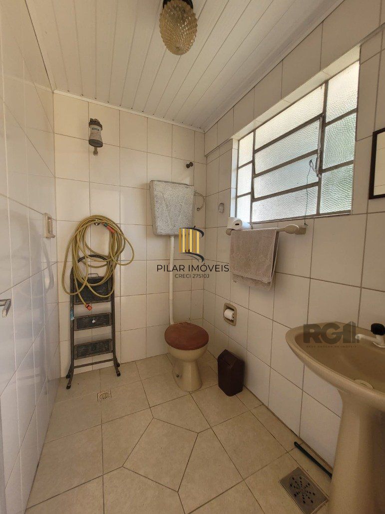 Casa 4 dormitórios no bairro Camaquã