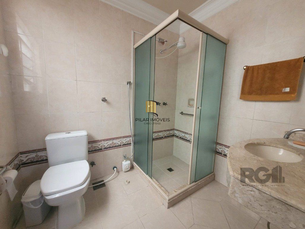 Casa 4 dormitórios no bairro Camaquã