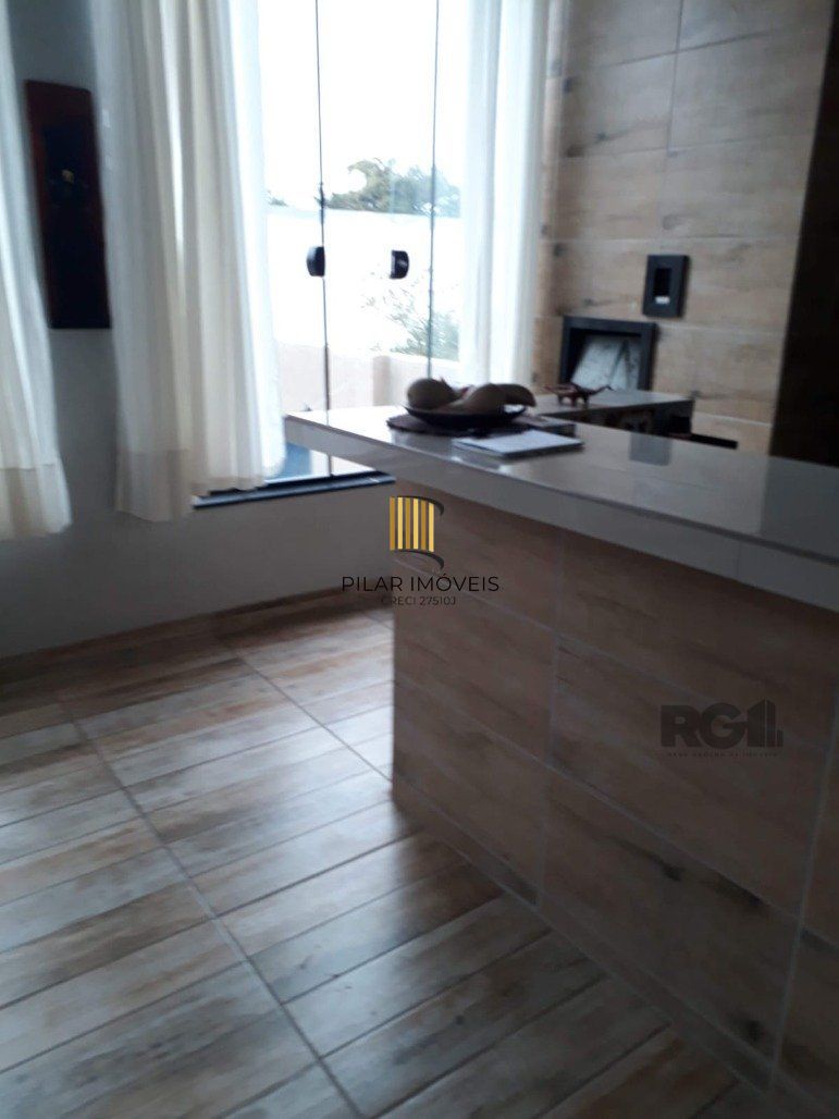 Casa 4 dormitórios no bairro Ipanema