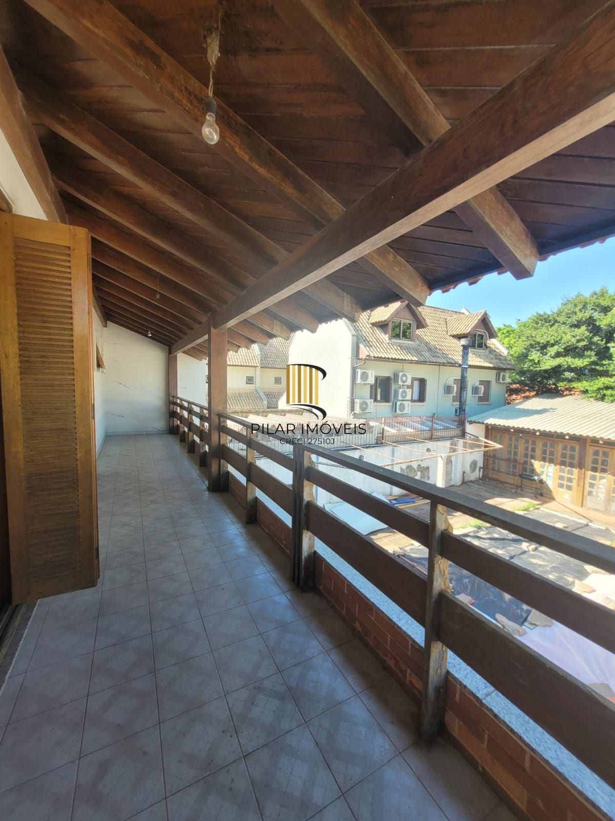 Casa 4 dormitórios no bairro Camaquã