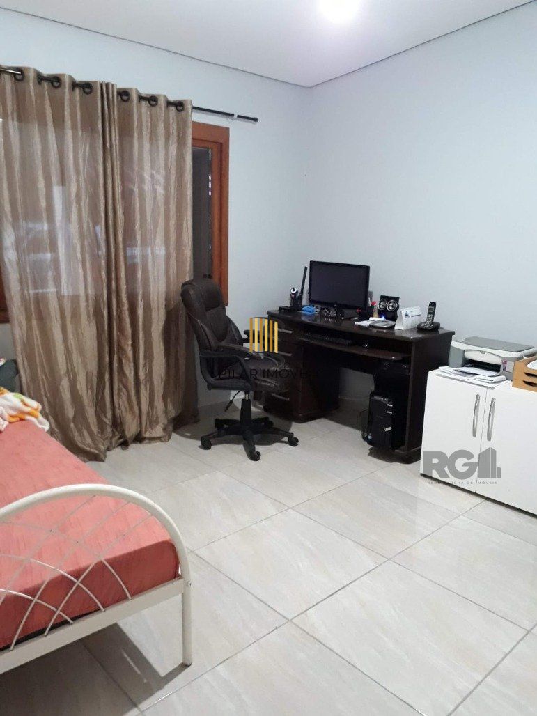 Casa 4 dormitórios no bairro Ipanema