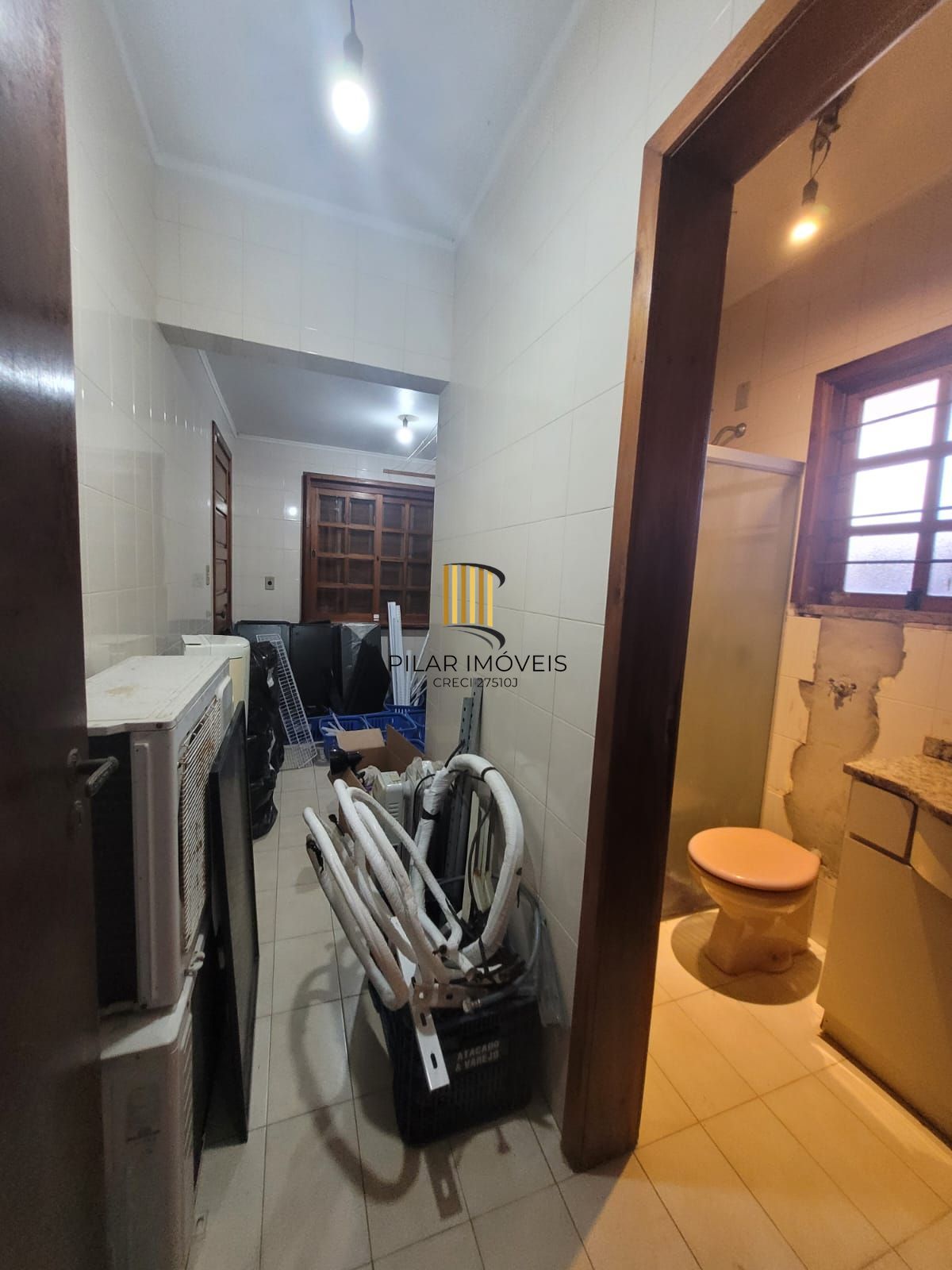 Casa 4 dormitórios no bairro Camaquã