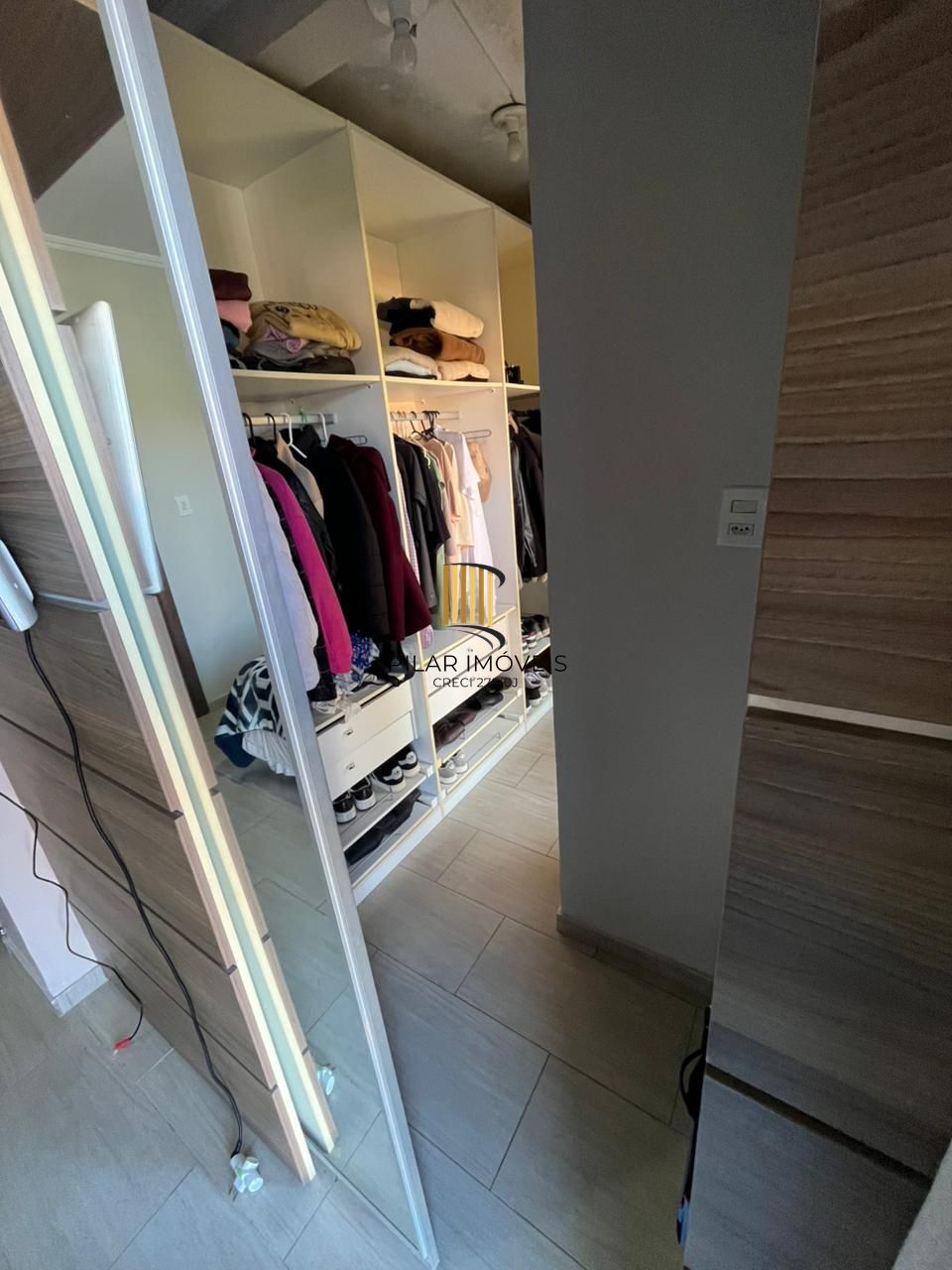 Sobrado triplex com piscina no Loteamento Nova Ipanema