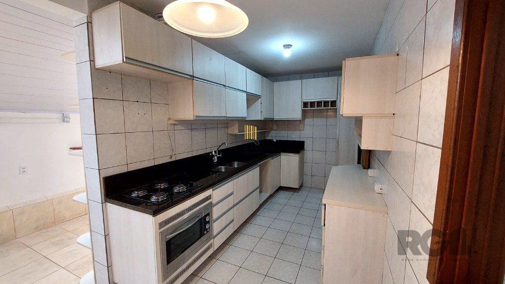 Casa de Condomínio 3 dormitórios no bairro Glória