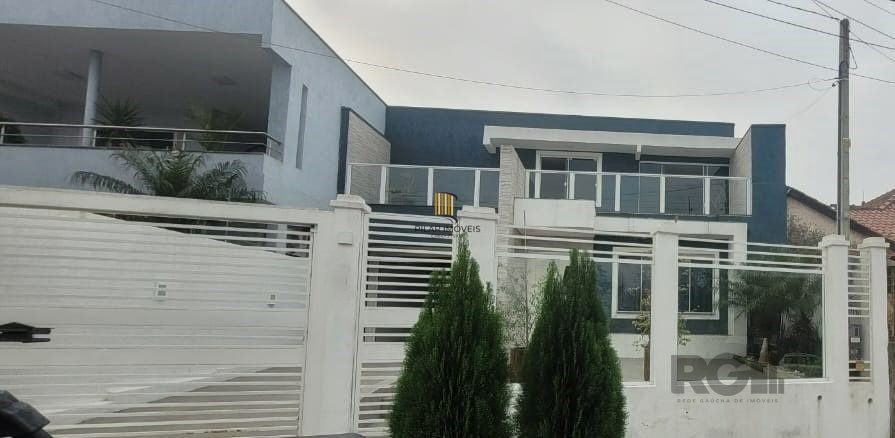 Sobrado 4 dormitórios no bairro Nossa Senhora das Graças