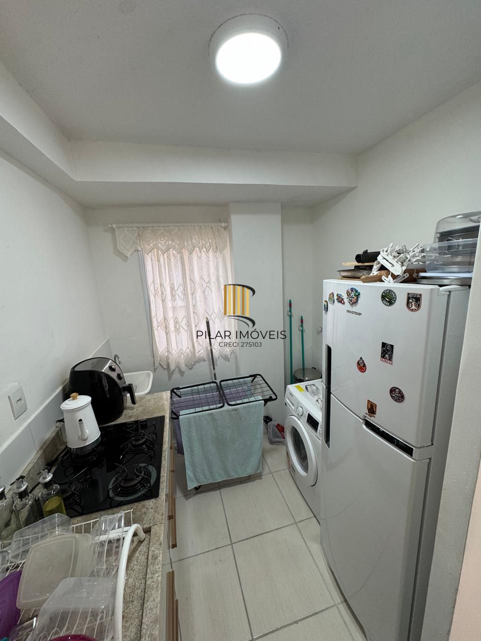Apartamento com sacada e churrasqueira