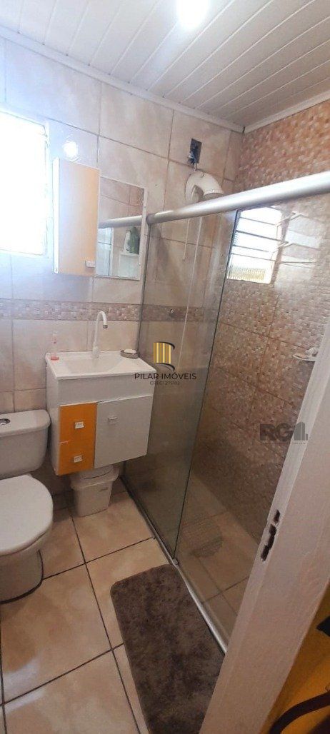 Casa 6 dormitórios no bairro Restinga