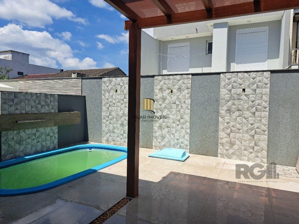 Casa 3 dormitórios no bairro Hípica