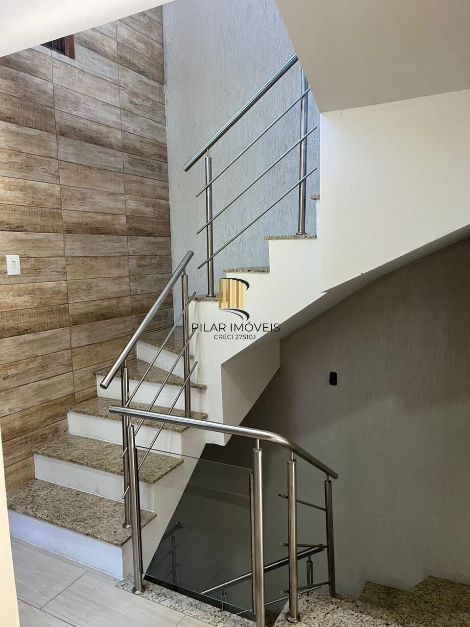 Sobrado triplex com piscina no Loteamento Nova Ipanema