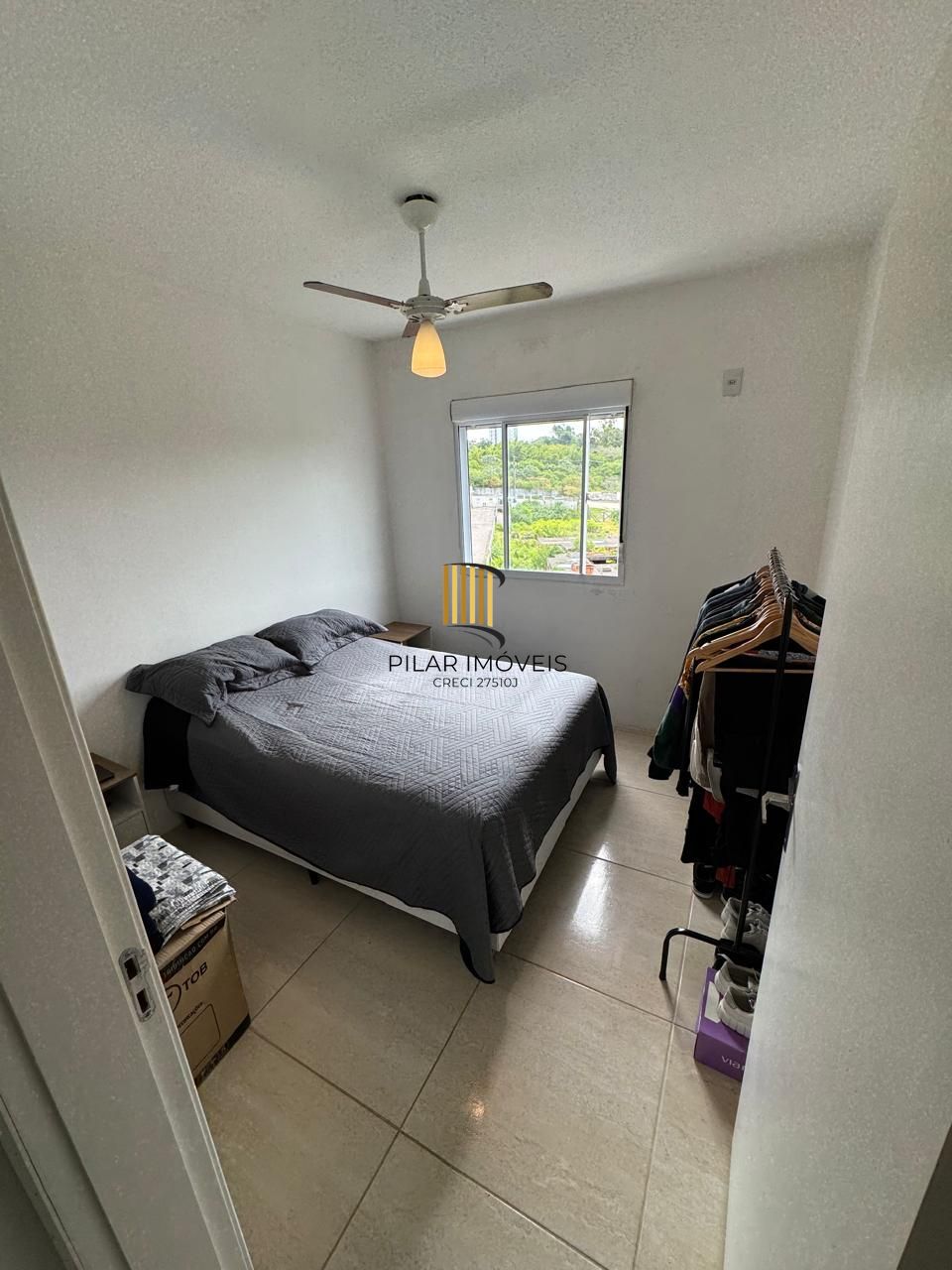 Apartamento com sacada e churrasqueira