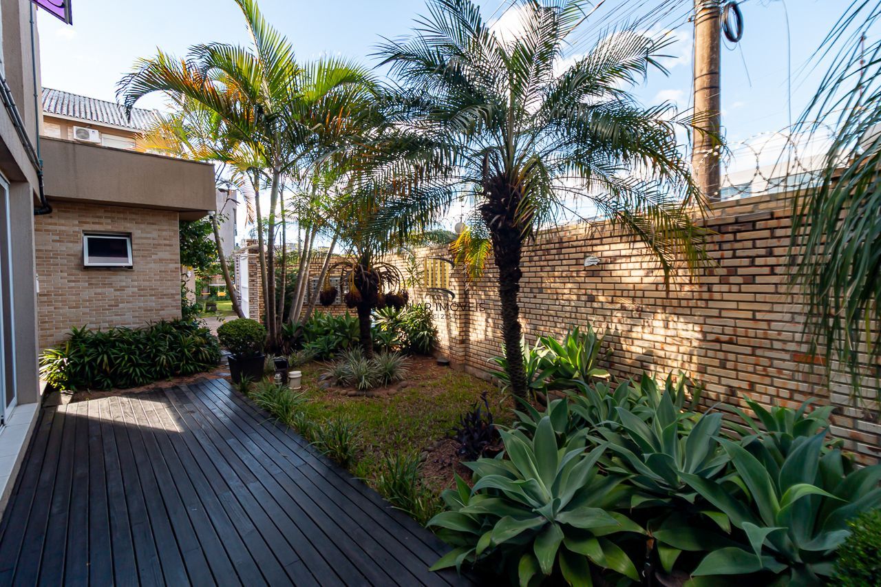 Casa de Condomínio 3 dormitórios no bairro Cavalhada