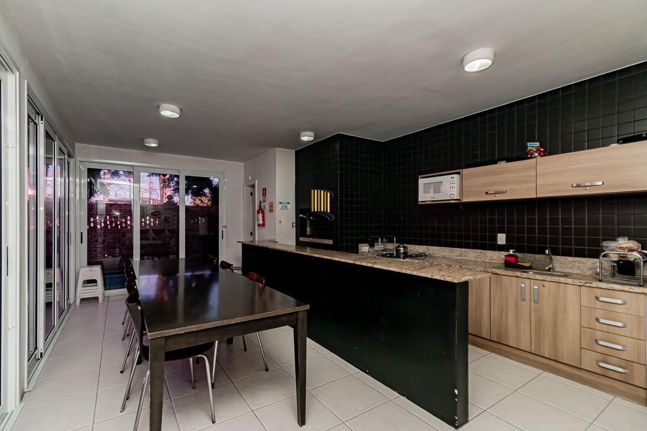 Casa de Condomínio 3 dormitórios no bairro Cavalhada