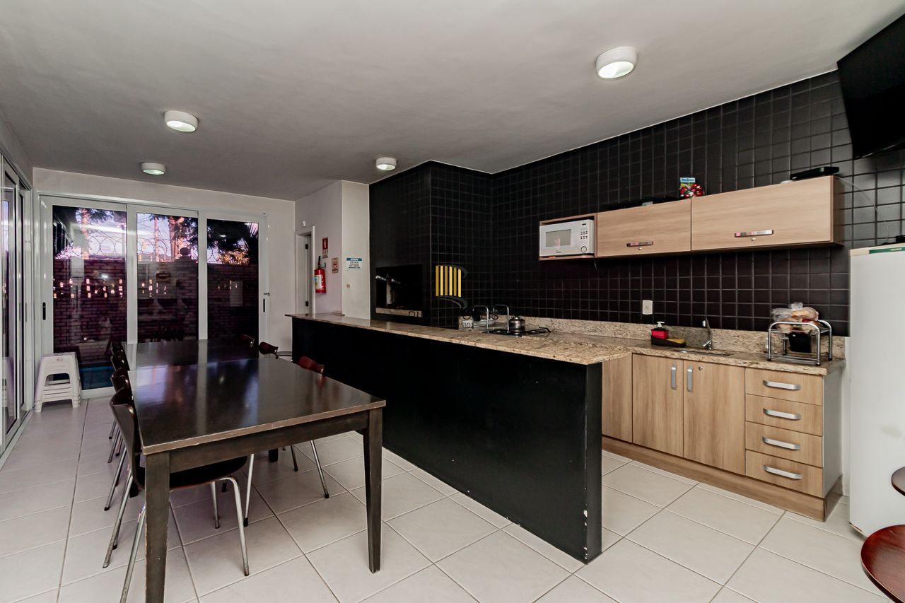 Casa de Condomínio 3 dormitórios no bairro Cavalhada